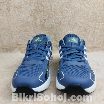 adidas Boost running shoes in a blue colorway with white